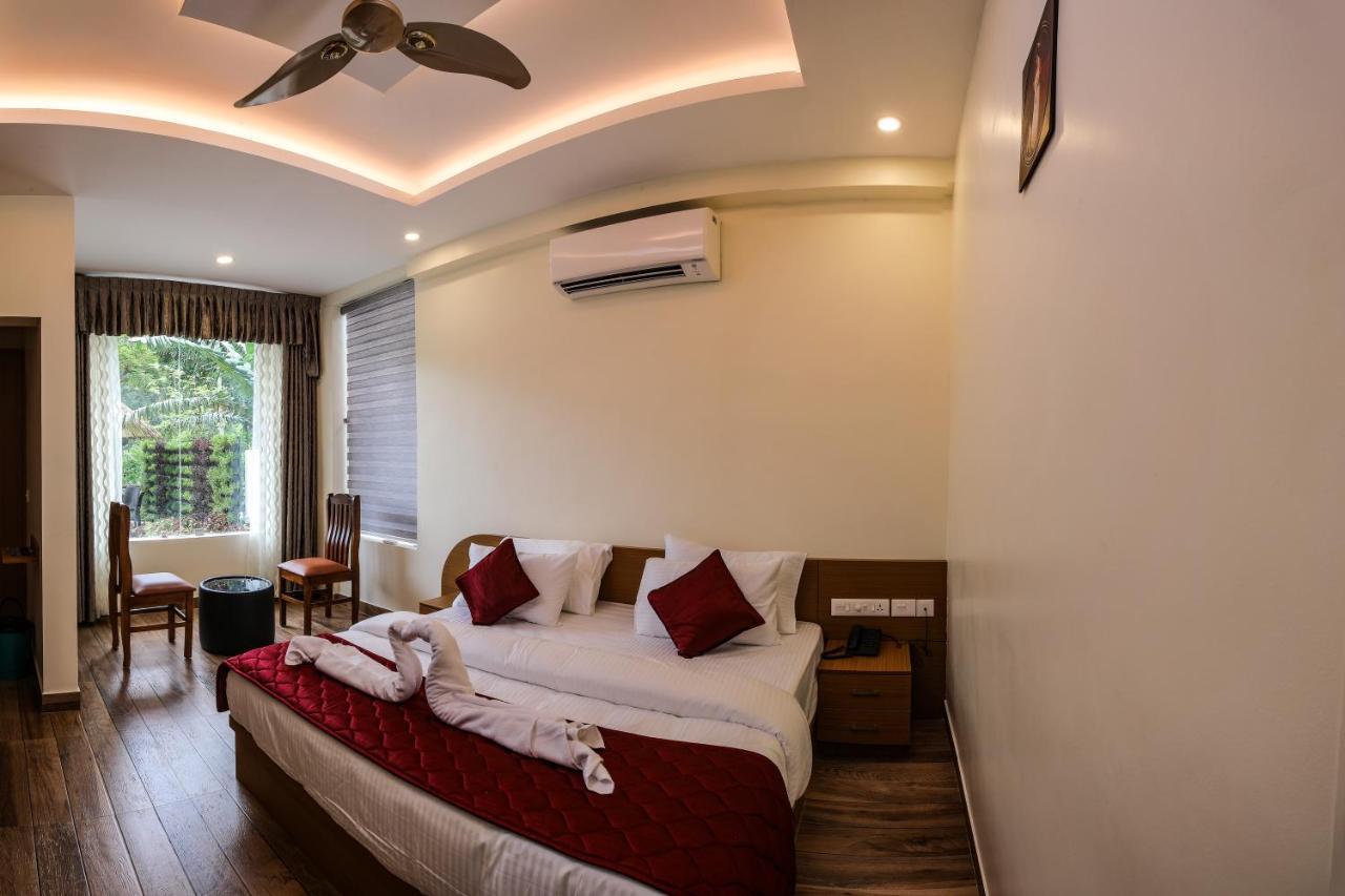Thenmala Hormuz Inn Kolattupuzha Экстерьер фото